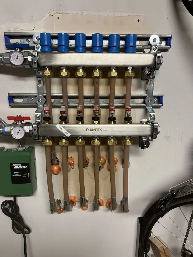 Plumber performing Water Heater Repair at a residential property in Mount Carmel